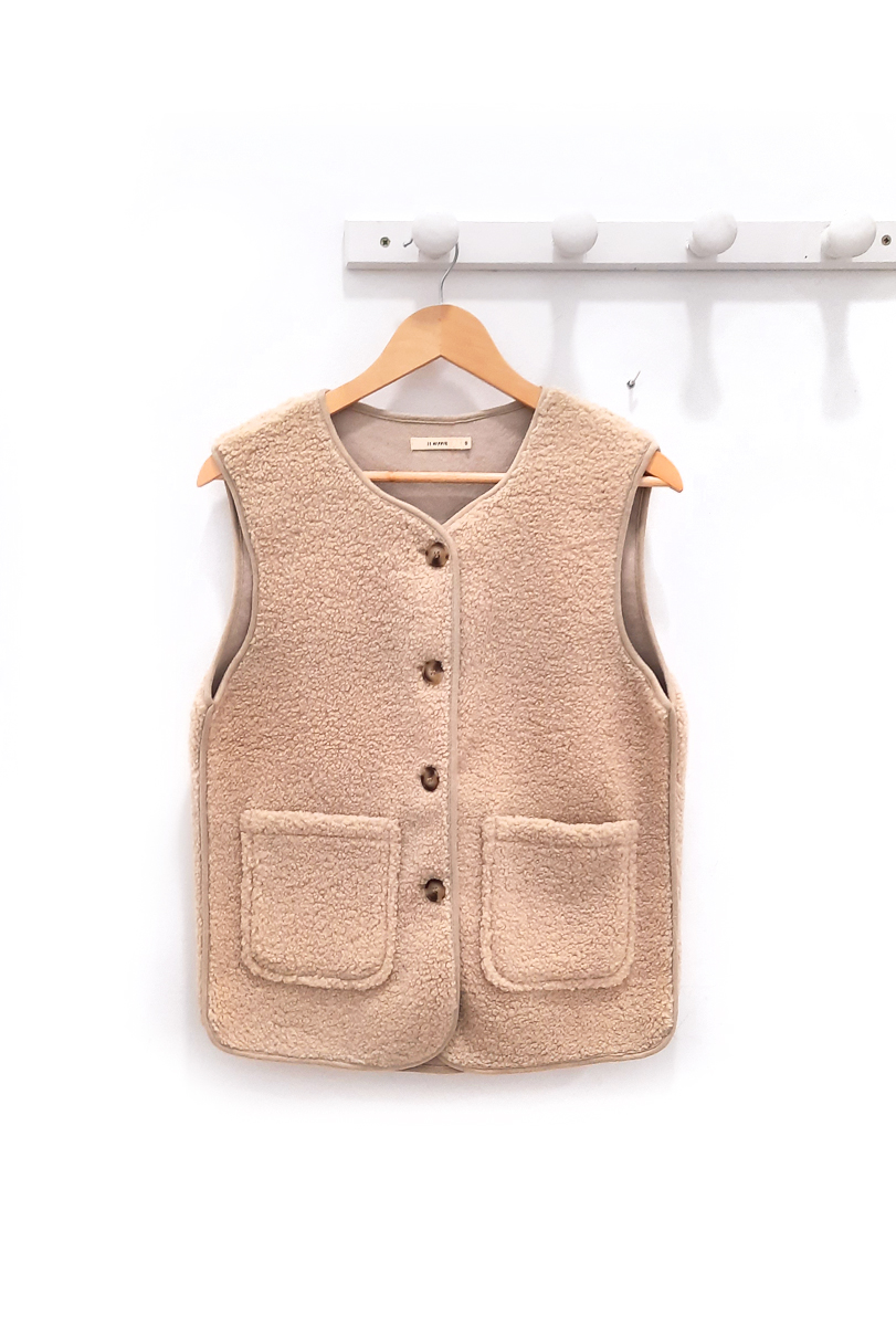 Chaleco beige Uri